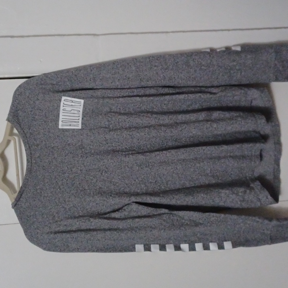 Hollister gray t-shirt with white racing stripes down the arm